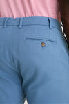 Close-up of classic Storm Andrews Flat-Front Short showcasing effortless style with a welt pocket and belt loops, embodying a high-end, fun, and confident aesthetic.