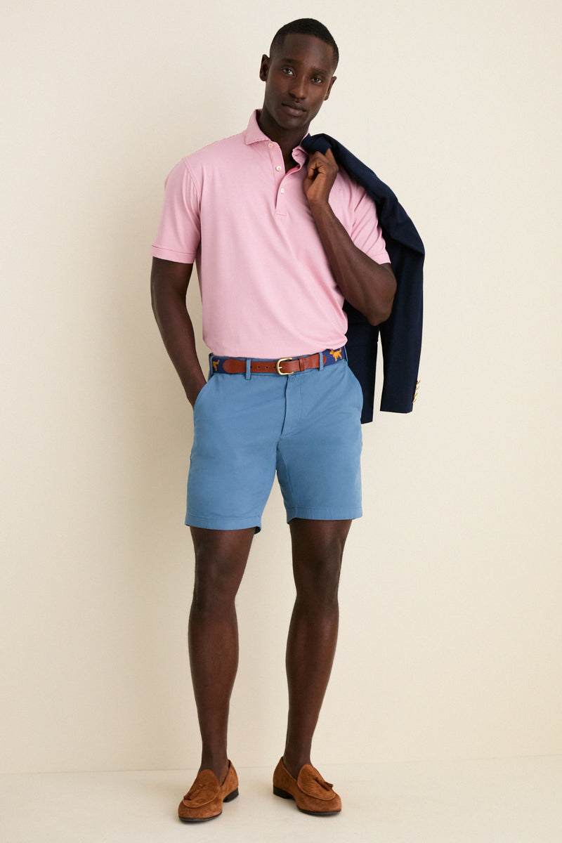 Chili Red Jubilee Performance Jersey Polo offers classic, high-end style with effortless comfort, featuring a tailored fit and technical fabric ideal for versatile, fun occasions.