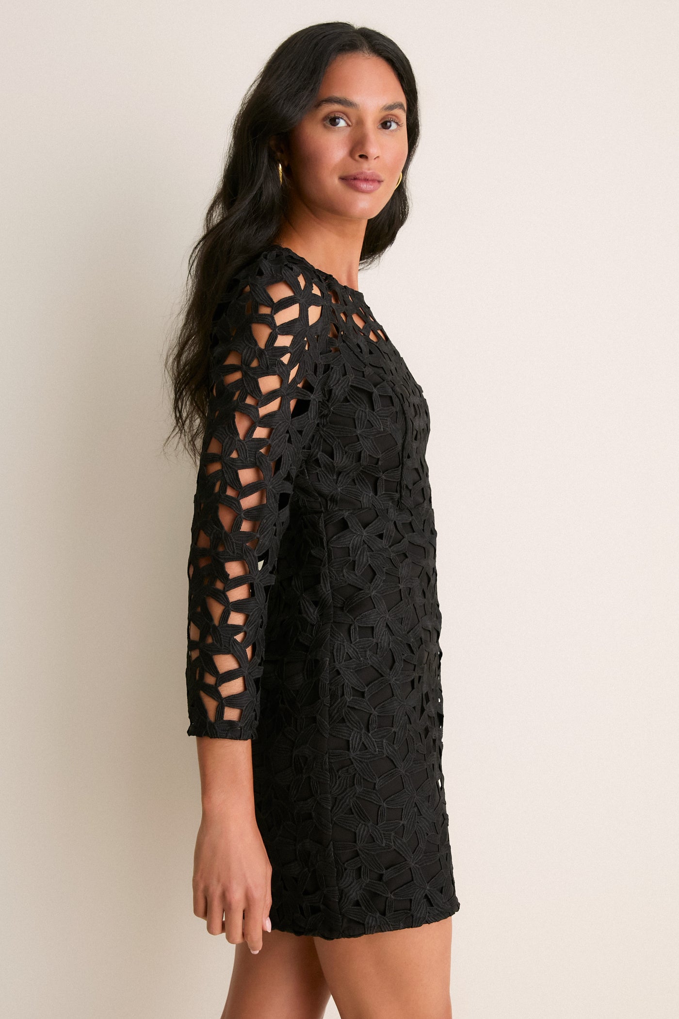 black dress eyelet Ulla Johnson Lakshmi Knit in and puff sleeves with elasticated ruffled cuffs Weekend in Portofino Eyelet Mini