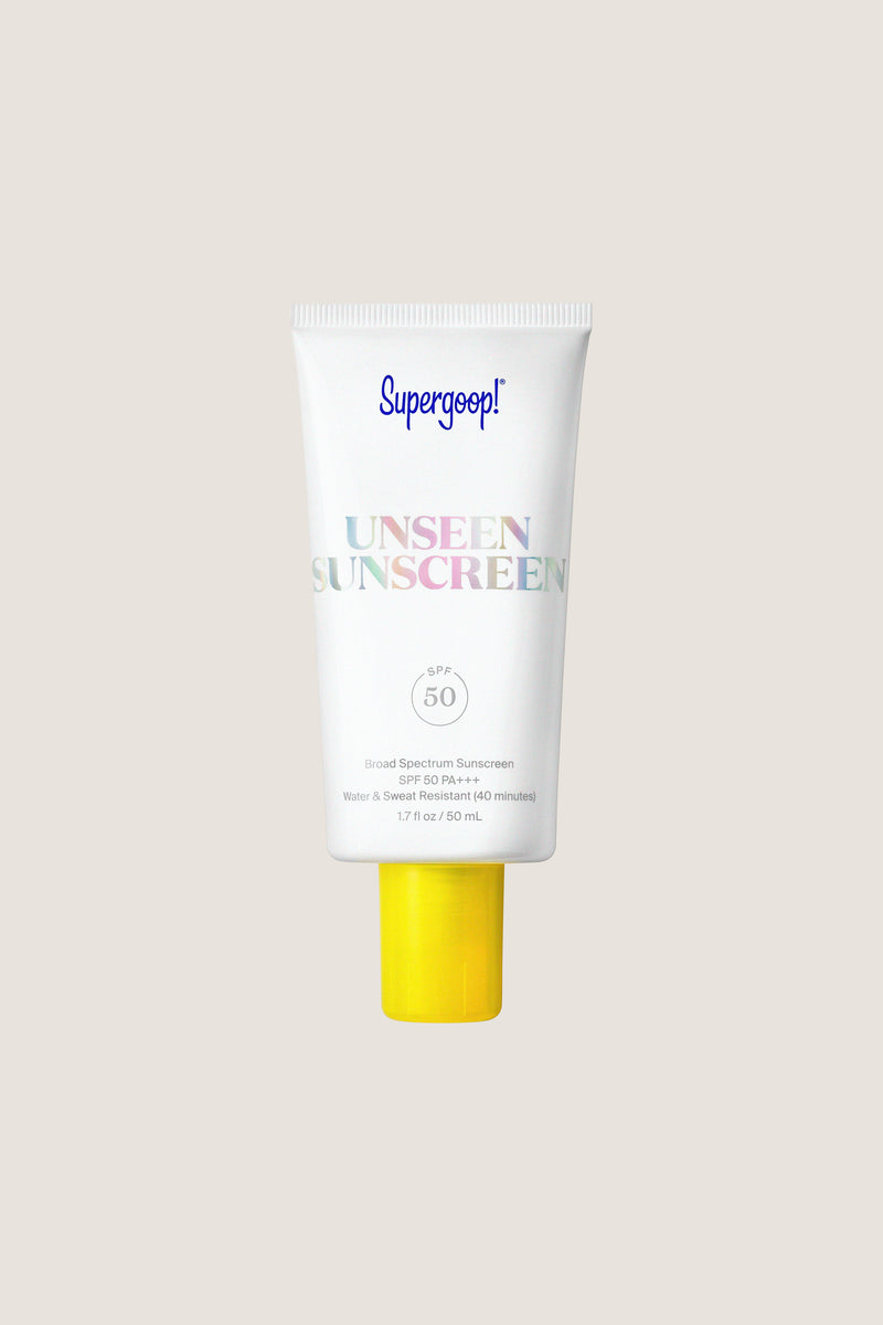 Unseen Sunscreen SPF 50 1.7 fl oz features a classic, high-end design with a bright yellow cap, offering effortless, fun protection and prepping skin for flawless makeup.