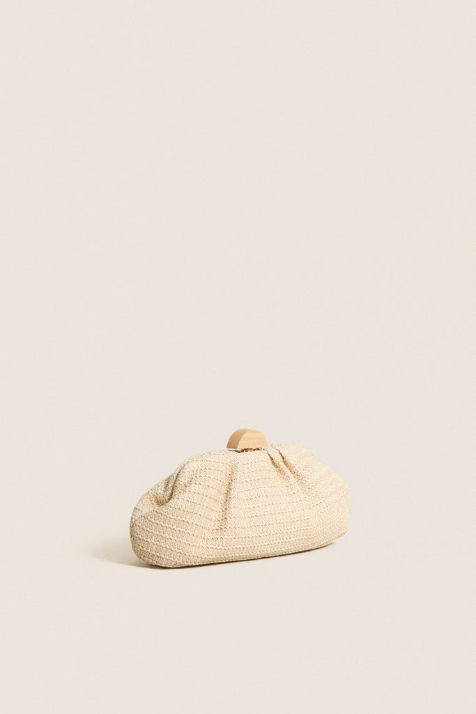 Natural Dorothea Clutch: A classic, high-end woven clutch with a wooden half-moon clasp and gold-tone chain, offering effortless style and versatile carry options.