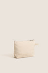 Natural Monogrammed Canvas Make-Up Bag with silver zipper and finger loop, offering a classic, effortless, and fun high-end travel companion for organizing essentials.