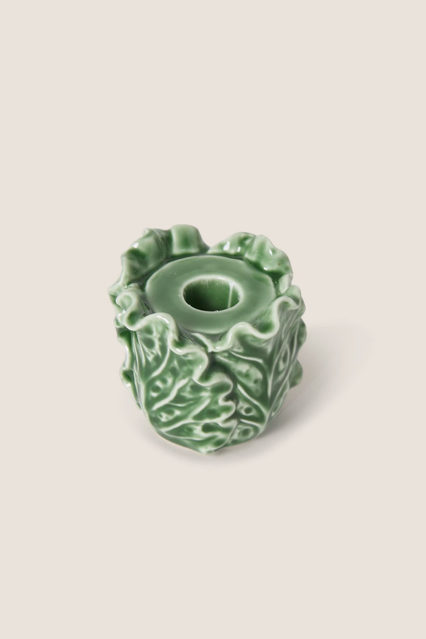 Cruciferous Leaf Taper Candleholder: A classic, high-end stoneware piece with effortless, fun ruffled cabbage leaf design, perfect for adding elegance to any table setting.