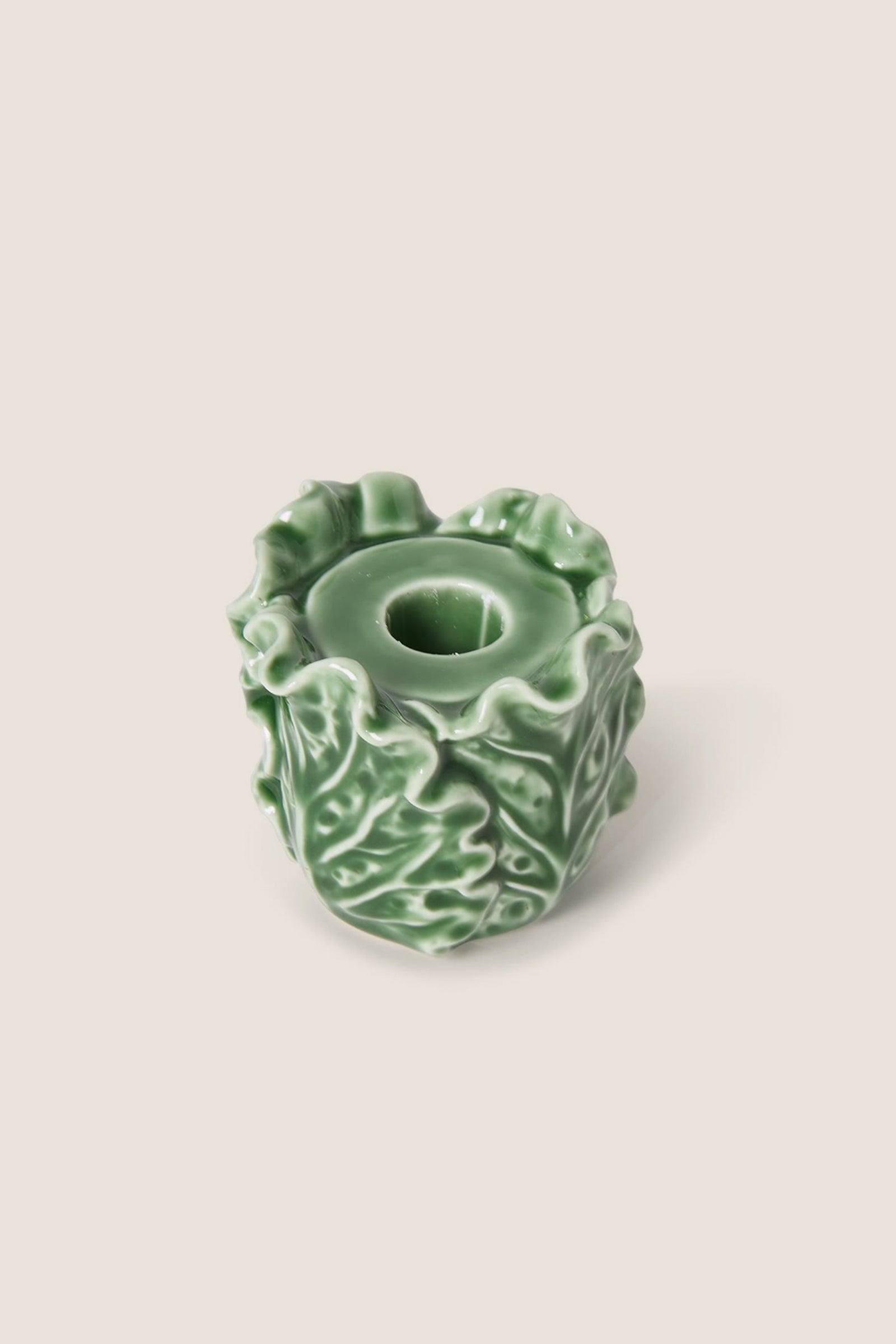 Cruciferous Leaf Taper Candleholder: A classic, high-end stoneware piece with effortless, fun ruffled cabbage leaf design, perfect for adding elegance to any table setting.