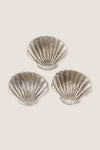 Silver Clam Shell Tidbit Dishes (Set of 3) embody classic coastal elegance with their effortless, high-end design, perfect for fun and stylish entertaining. Crafted in polished, recycled aluminum.