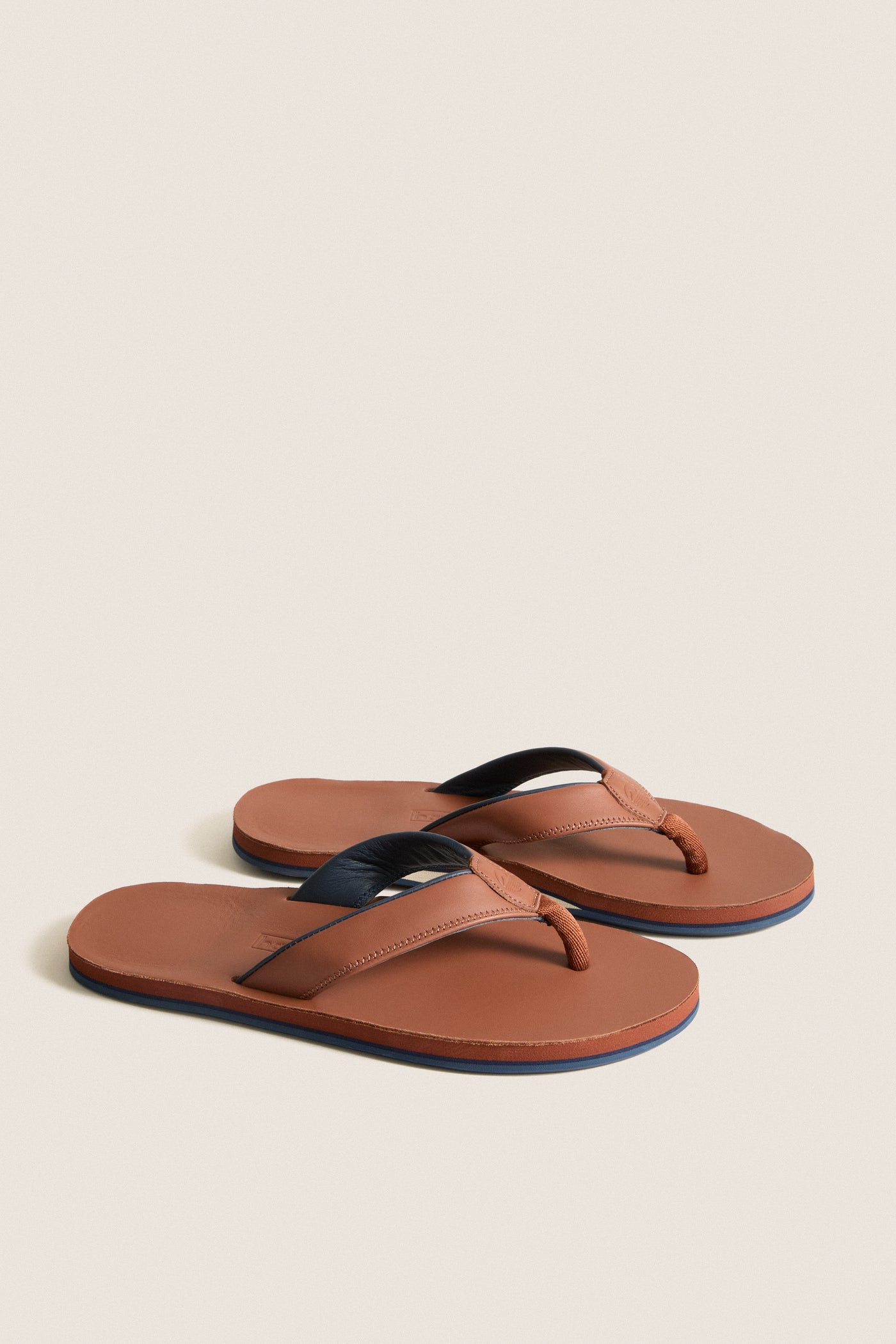 Cask Clipper Waterproof Leather Sandal: Classic men's flip-flops with tan-brown footbeds, memory foam-cushioned straps, and arch support for an effortless, high-end, and fun summer experience.