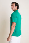 Model wearing the Home Turf Performance Sport Players Shirt, showcasing its classic, effortless style with a 4-button placket and chest pocket, embodying fun and high-end fashion.