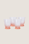 Peony Pink Spiral Tumbler (Set of 4), featuring classic rib-patterned, swirled texture with a flared silhouette, offers an effortless, high-end touch to any fun tablescape.