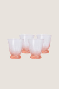 Peony Pink Spiral Tumbler (Set of 4), featuring classic rib-patterned, swirled texture with a flared silhouette, offers an effortless, high-end touch to any fun tablescape.