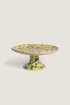 Yellow and Verde Splatter Cake Stand with a classic, hand-painted speckled design on ceramic; effortlessly blends fun and high-end aesthetics, perfect for serving treats.