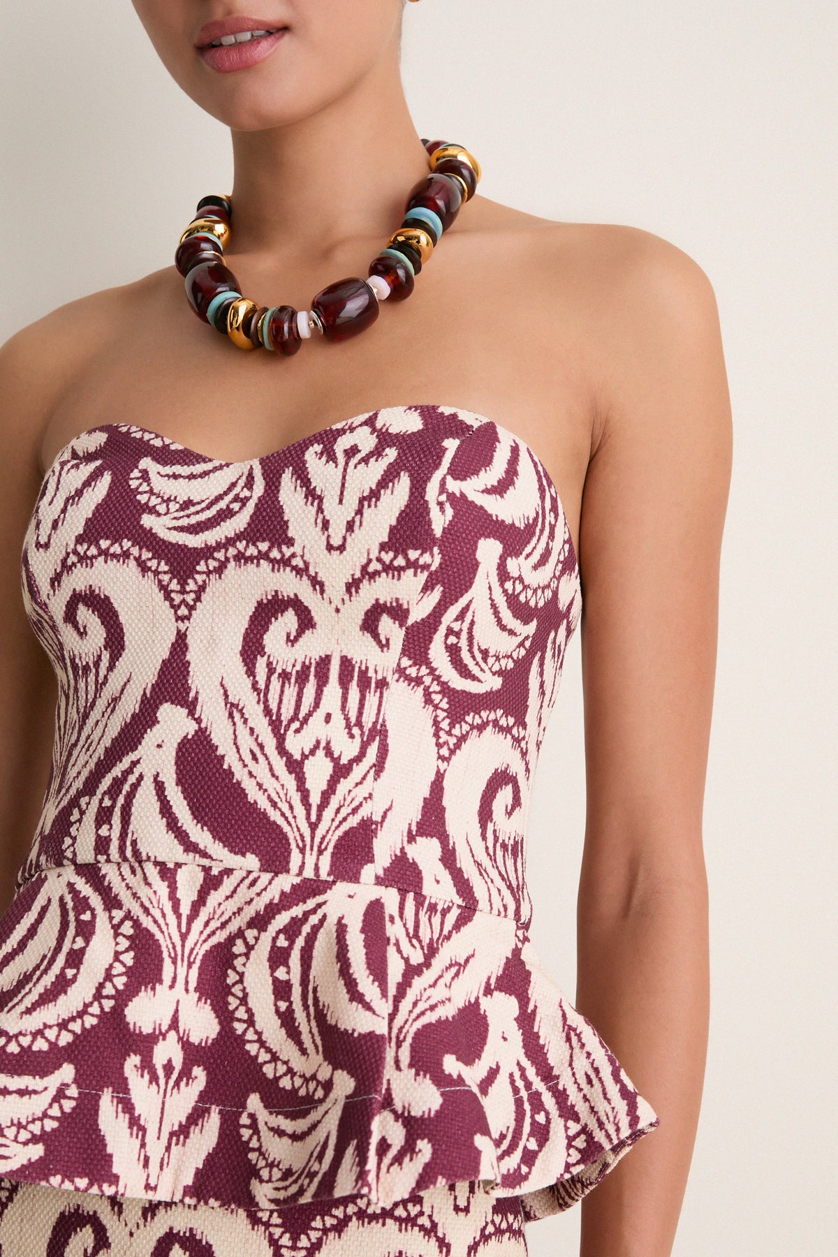 Tropikat Print Burgundy Strapless Peplum Top