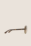 Light Havana Cats 5000 Classic Sunglasses by Ray-Ban; a side-profile view showcasing tortoiseshell round frames with brown gradient lenses, exuding effortless, high-end style and classic versatility.