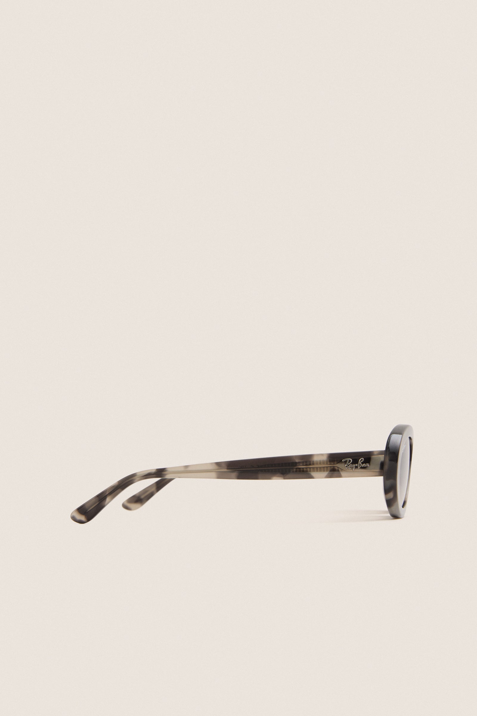 Classic Opal Grey Havana RB2223 Sunglasses with tortoiseshell plastic frame and Ray-Ban logo on the arm, embodying effortless, high-end style for fun, confident wear.