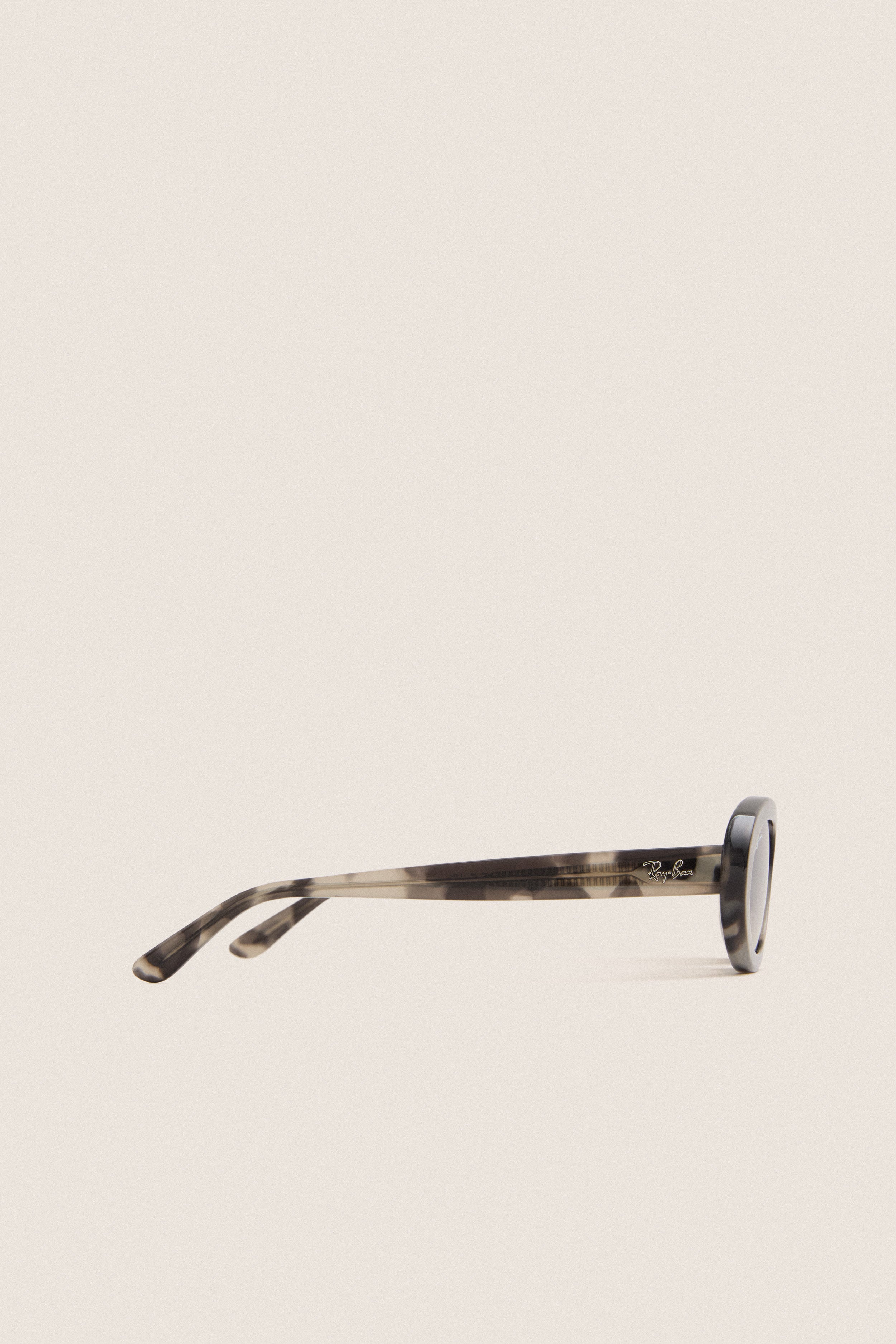 Classic Opal Grey Havana RB2223 Sunglasses with tortoiseshell plastic frame and Ray-Ban logo on the arm, embodying effortless, high-end style for fun, confident wear.