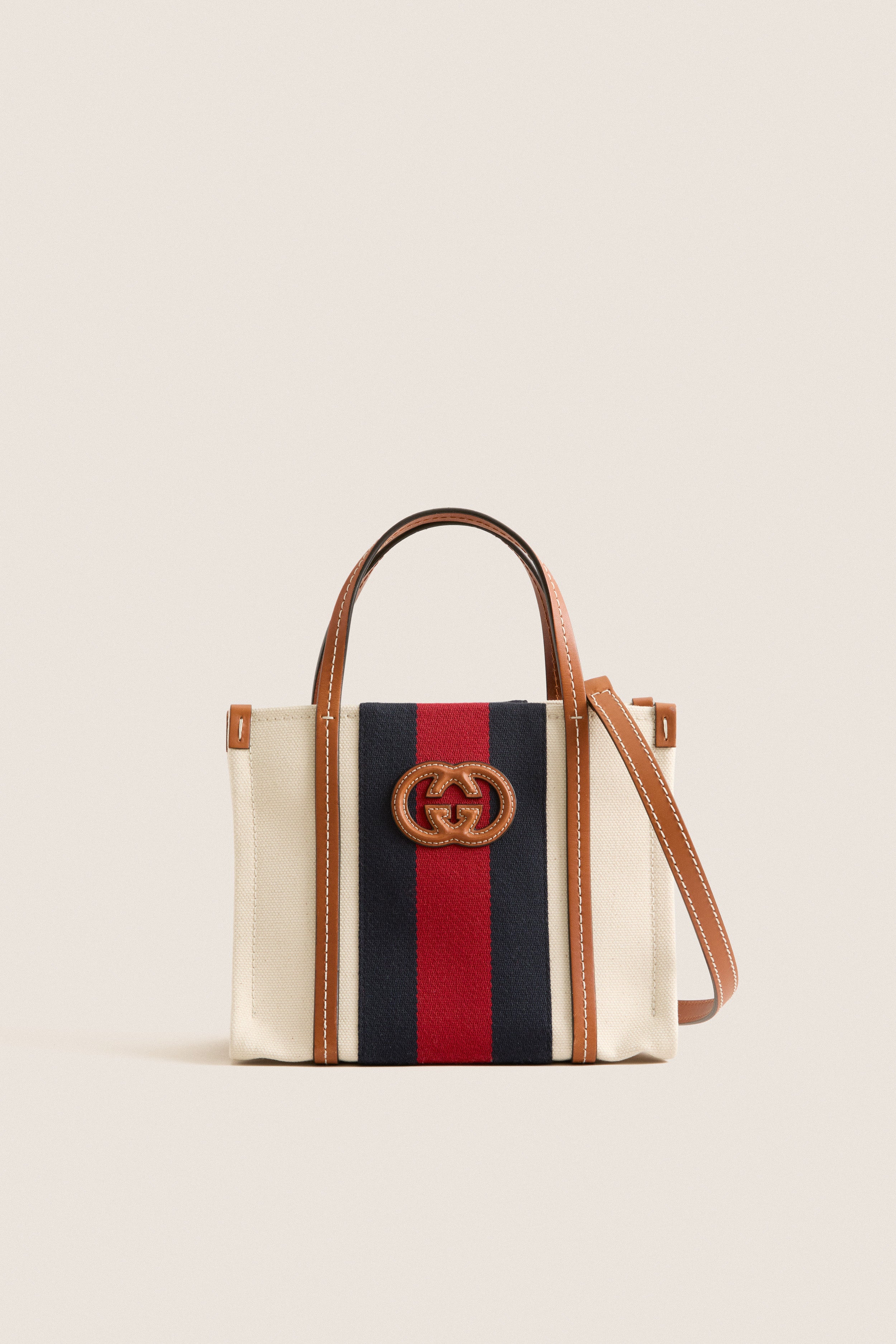 GUCCI Beige Interlocking G X Leather Two-Way Handbag | Tuckernuck