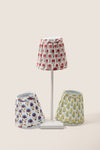 Azure Shade Cover: Classic three-armed stand with pleated floral fabric shades, offering an effortless, fun, high-end touch to your decor. Rechargeable lamp compatible.