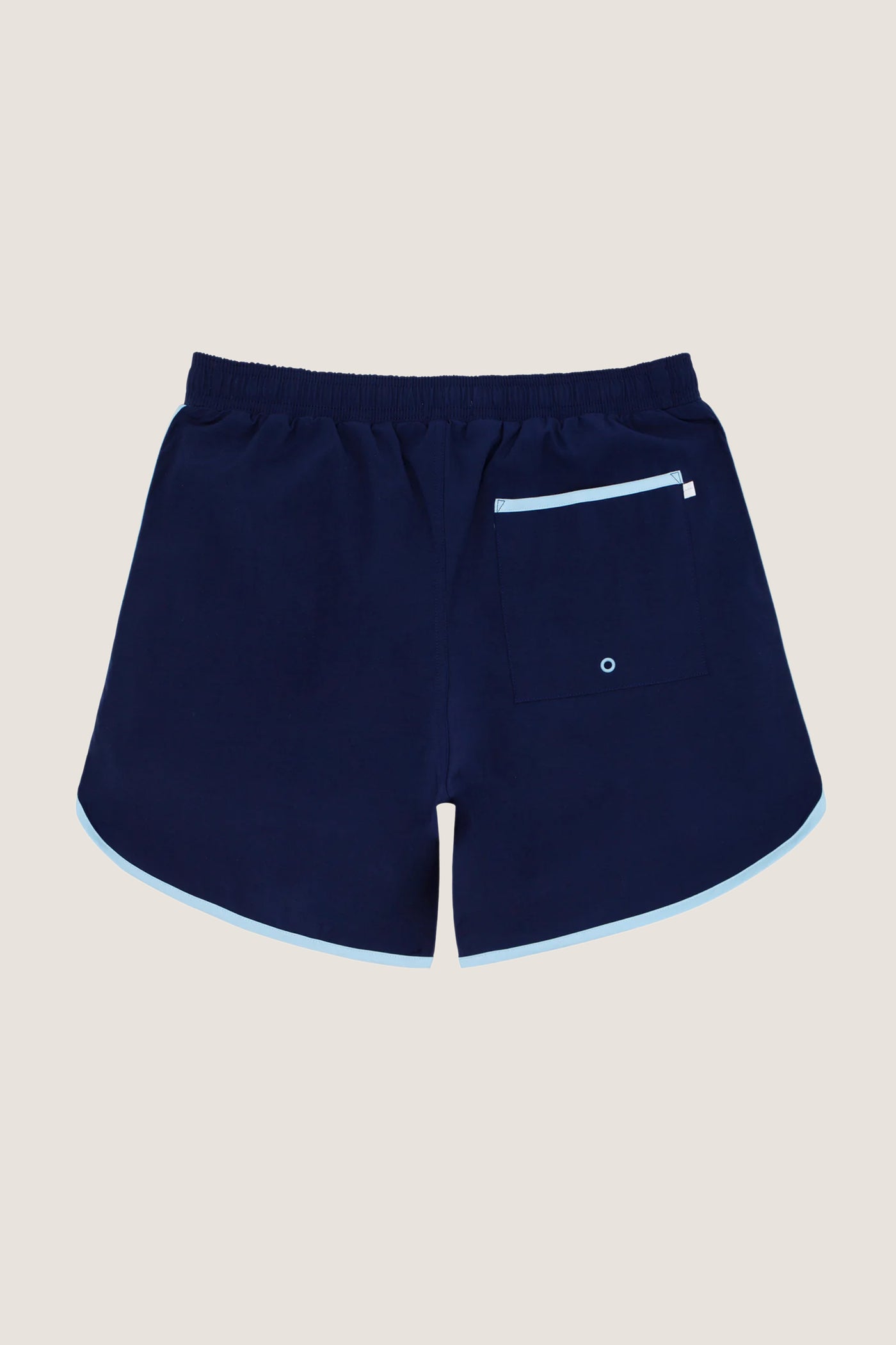 Navy Boardie swim trunks, classic and effortless, feature an elastic drawstring waist, side pockets, and a back patch pocket. High-end design for fun, all-day comfort. 