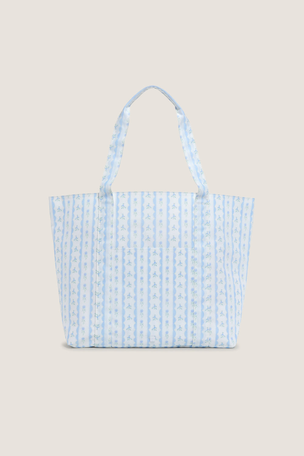 Floral Blue Ribbon Jumbo Tote features classic blue-and-white stripes with floral motifs, offering an effortless, high-end touch to your fun, everyday carry-all needs.