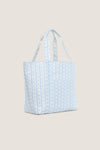 Floral Blue Ribbon Jumbo Tote, a classic and effortless shopper bag with soft blue vertical stripes and tiny floral motifs, perfect for fun, high-end everyday errands.