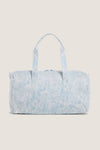 Blue Bunny Toile Weekender Duffel Bag, a classic, fun, and effortless travel tote with detachable strap, water-resistant finish, and interior mesh pocket, perfect for high-end getaways.