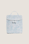 Blue Bunny Toile Take Away Insulated Lunch Bag, a classic, effortless accessory with a fun design, featuring embossed zippers and a handy carry-handle, embodying high-end practicality.