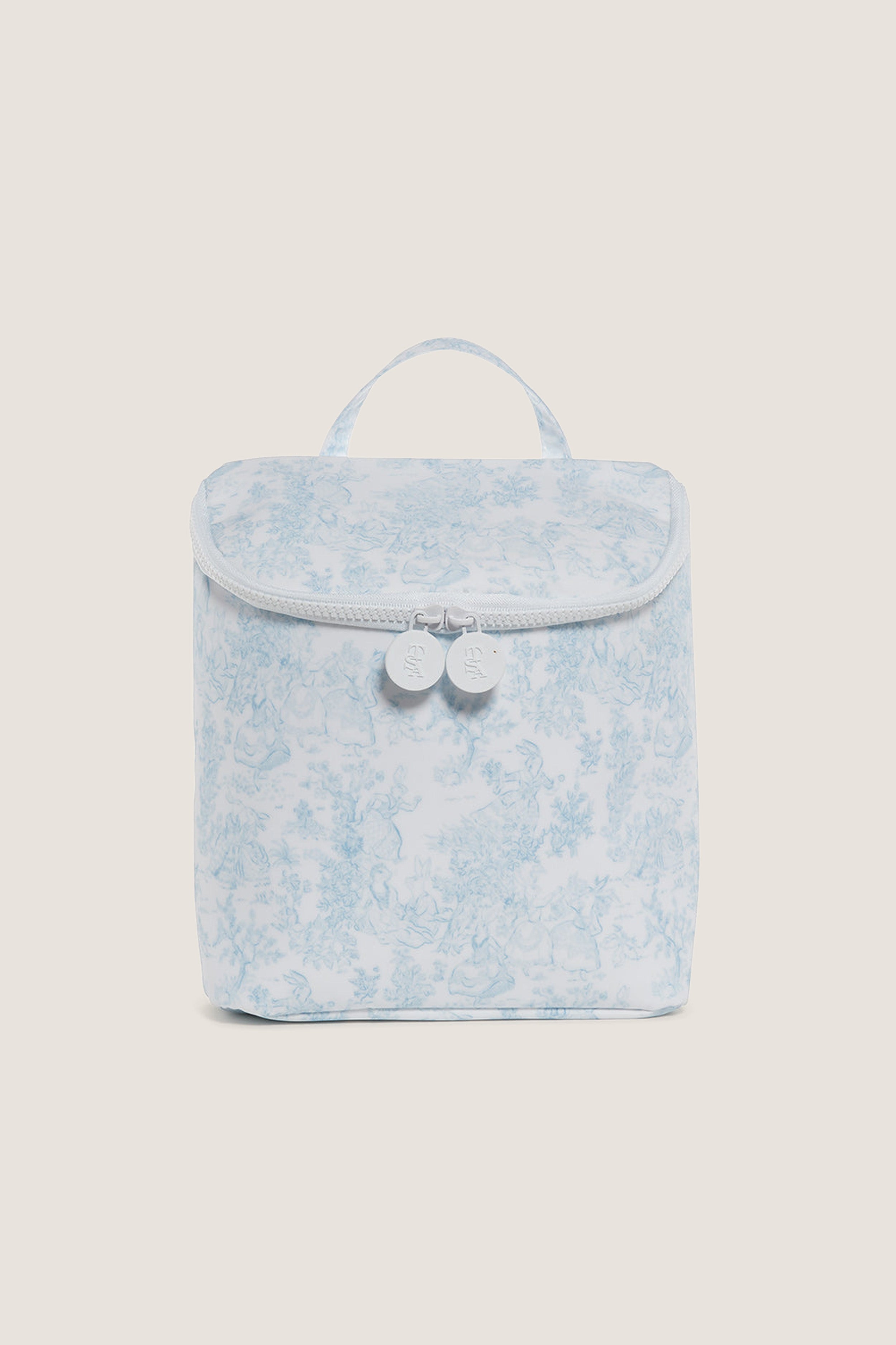 Blue Bunny Toile Take Away Insulated Lunch Bag, a classic, effortless accessory with a fun design, featuring embossed zippers and a handy carry-handle, embodying high-end practicality.