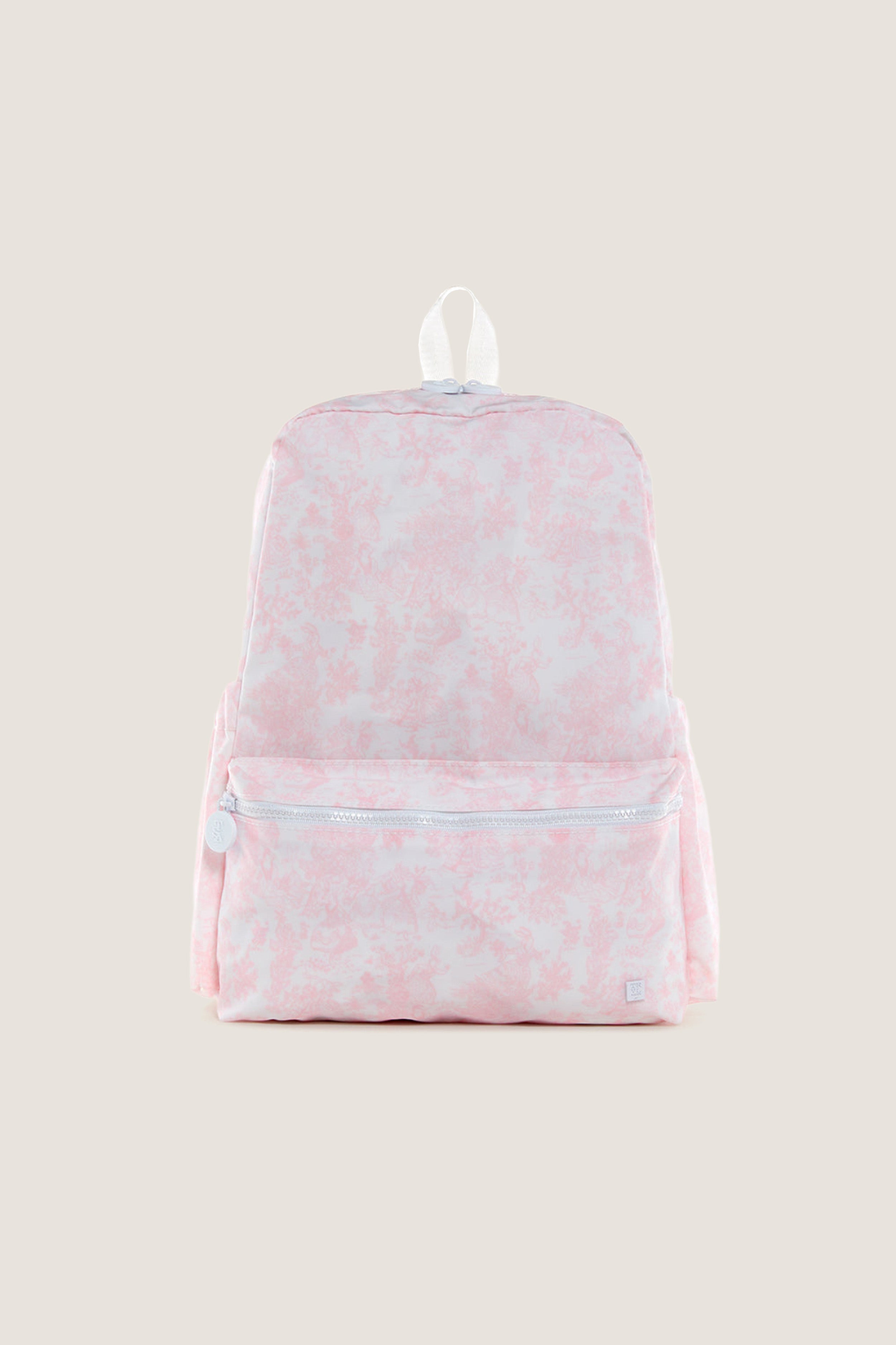 Pink Bunny Toile Backpack featuring a classic, effortless design with a front zip pocket and top carry-handle, ideal for a fun and high-end day out.