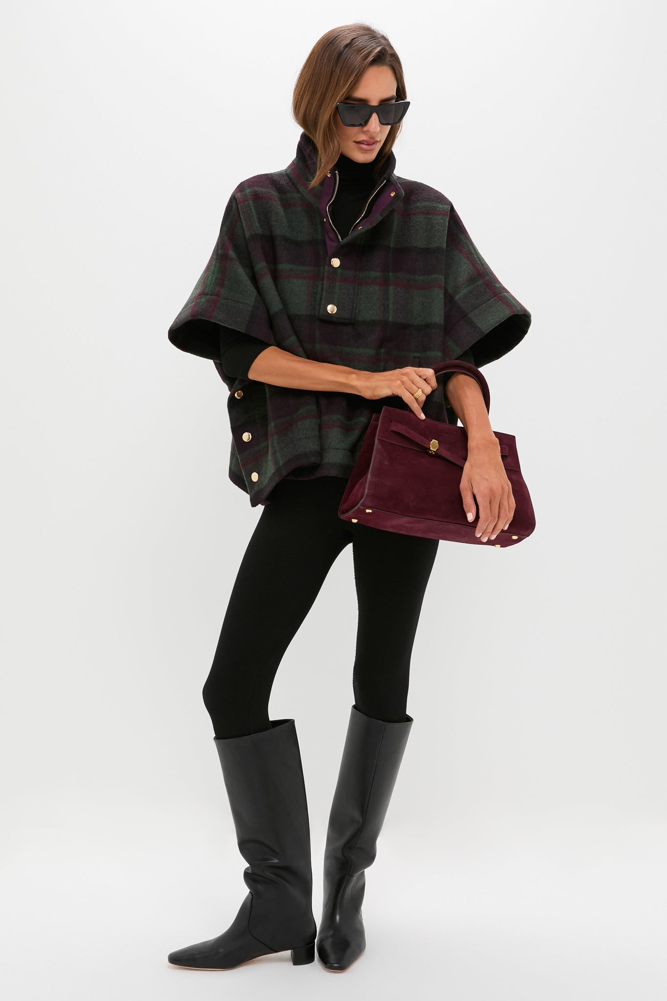 Model showcasing an effortlessly classic ensemble, highlighting a high-end Gold Berry Vine Ring that adds a fun, feminine flourish to the outfit.