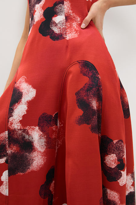 Crimson Red Water Floral Cosmic Midi Dress with black and white painterly blotches, showcasing curved seamlines, textured fabric, and an effortless, high-end design with a classic, fun style.