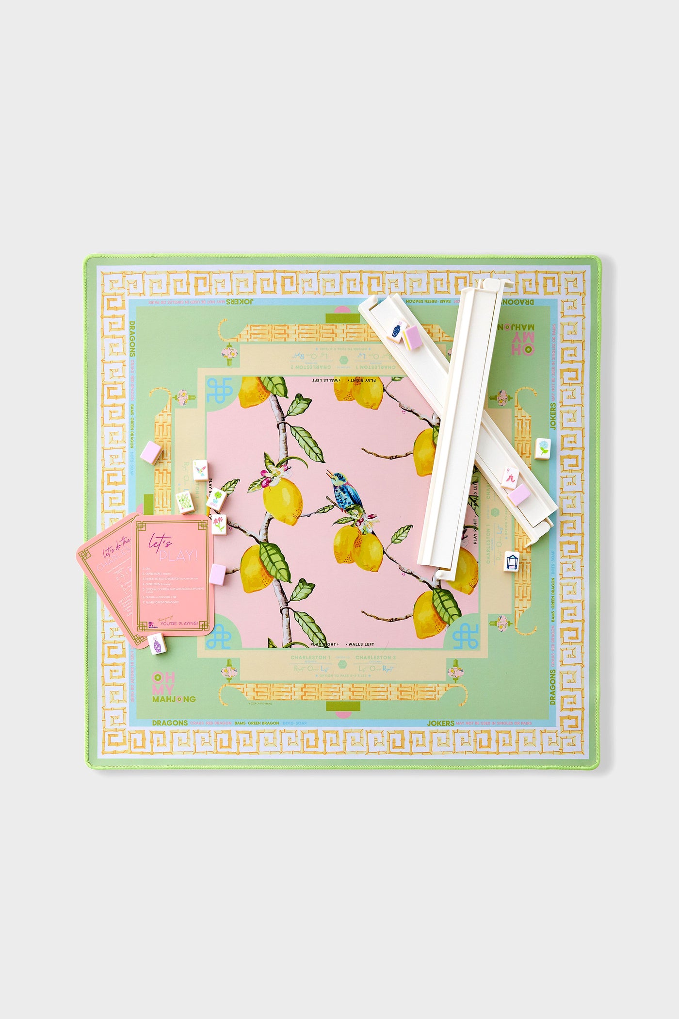 Classic Citrus Songbird Playing Mat with pastel mahjong set, blending effortless fun and high-end design with lemons and a bird motif on a non-slip surface.