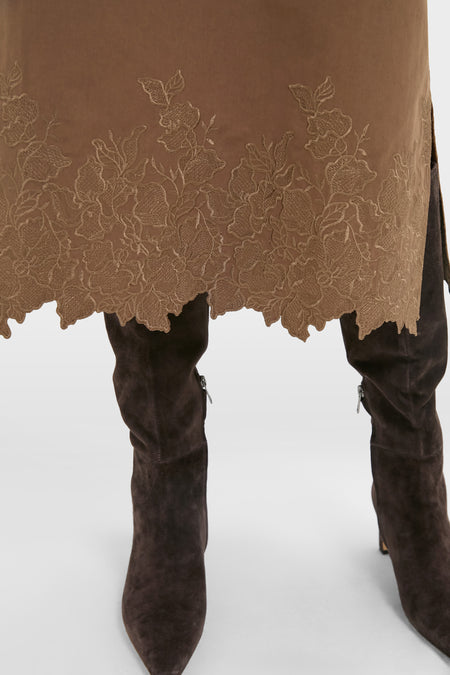Mocha Embroidery Eliza Midi Dress with scalloped floral hem and classic dark brown suede boots, embodying effortless sophistication and fun, high-end style.