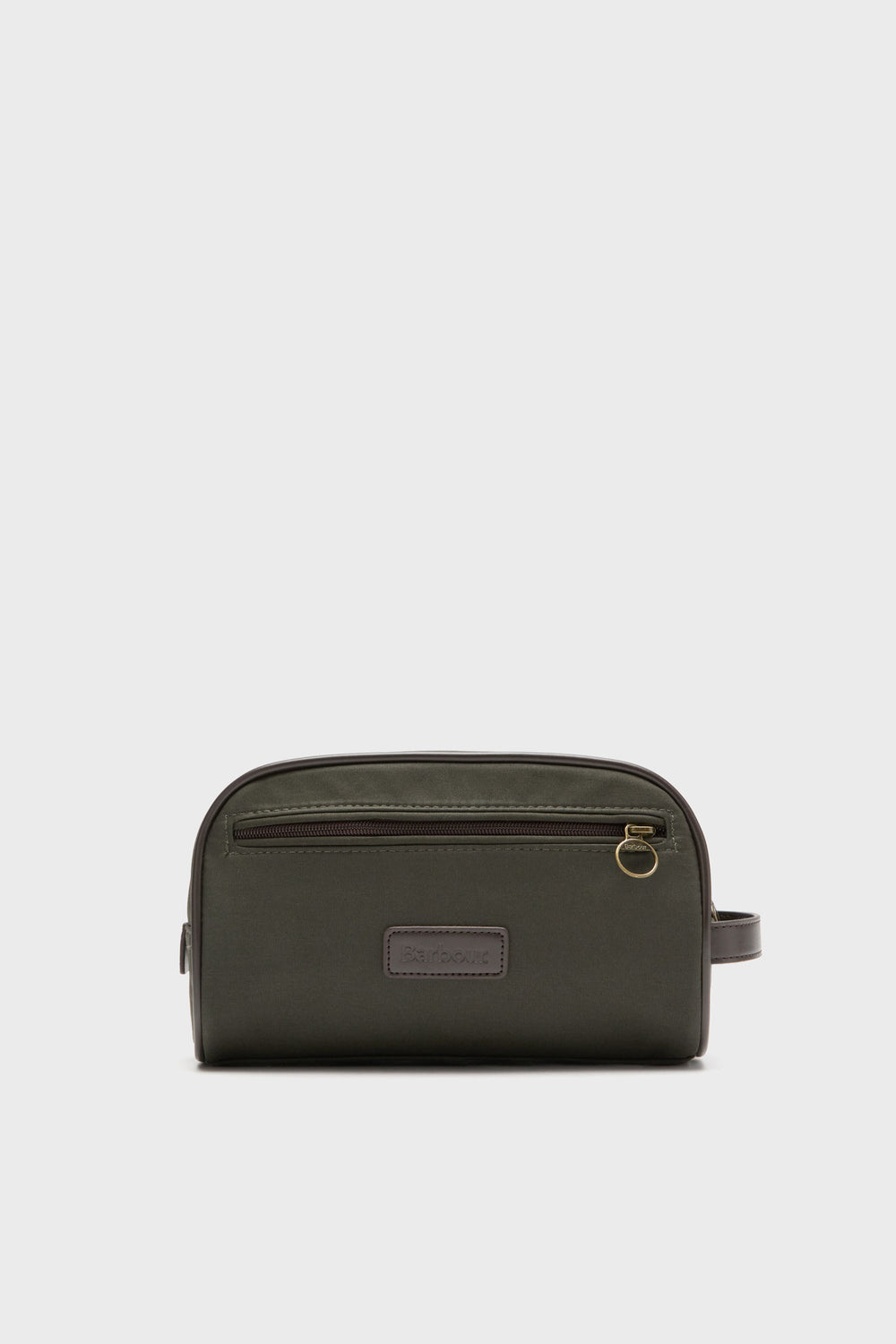 The Barbour Olive Wax Washbag is a rectangular, dark green men’s toiletry bag with a zippered front pocket, leather patch, gold zipper pull, and side handle.