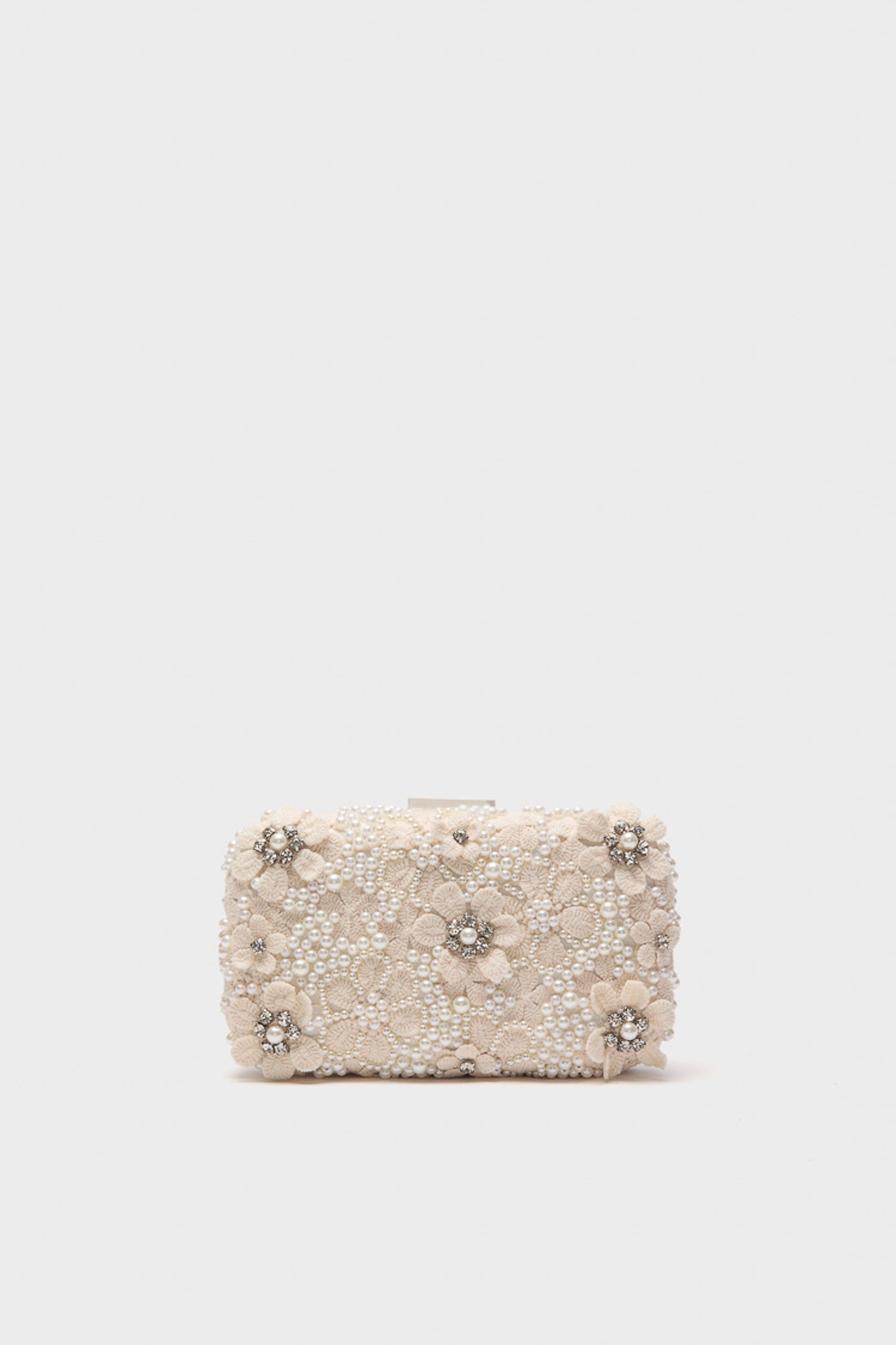 The Olga Berg rectangular ivory bridal clutch features beaded floral embellishments and small pearls, making it a perfect addition to elegant evening bag collections.