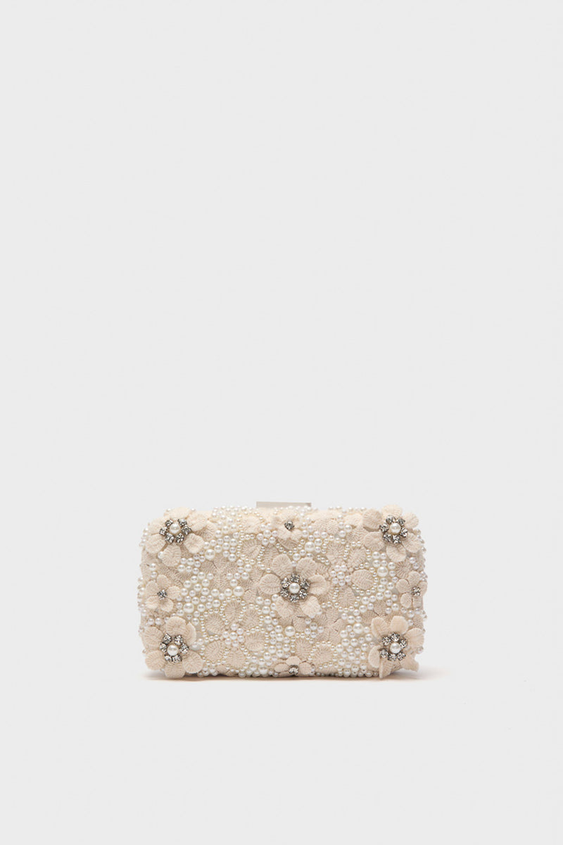 The Olga Berg rectangular ivory bridal clutch features beaded floral embellishments and small pearls, making it a perfect addition to elegant evening bag collections.