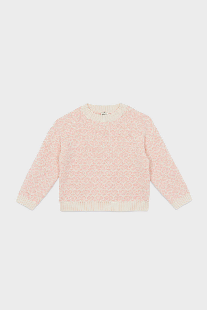 A light pink knit Pink Heart Sweater with a textured diamond pattern and cream ribbed trim from Bonton—perfect for kids’ wardrobes.