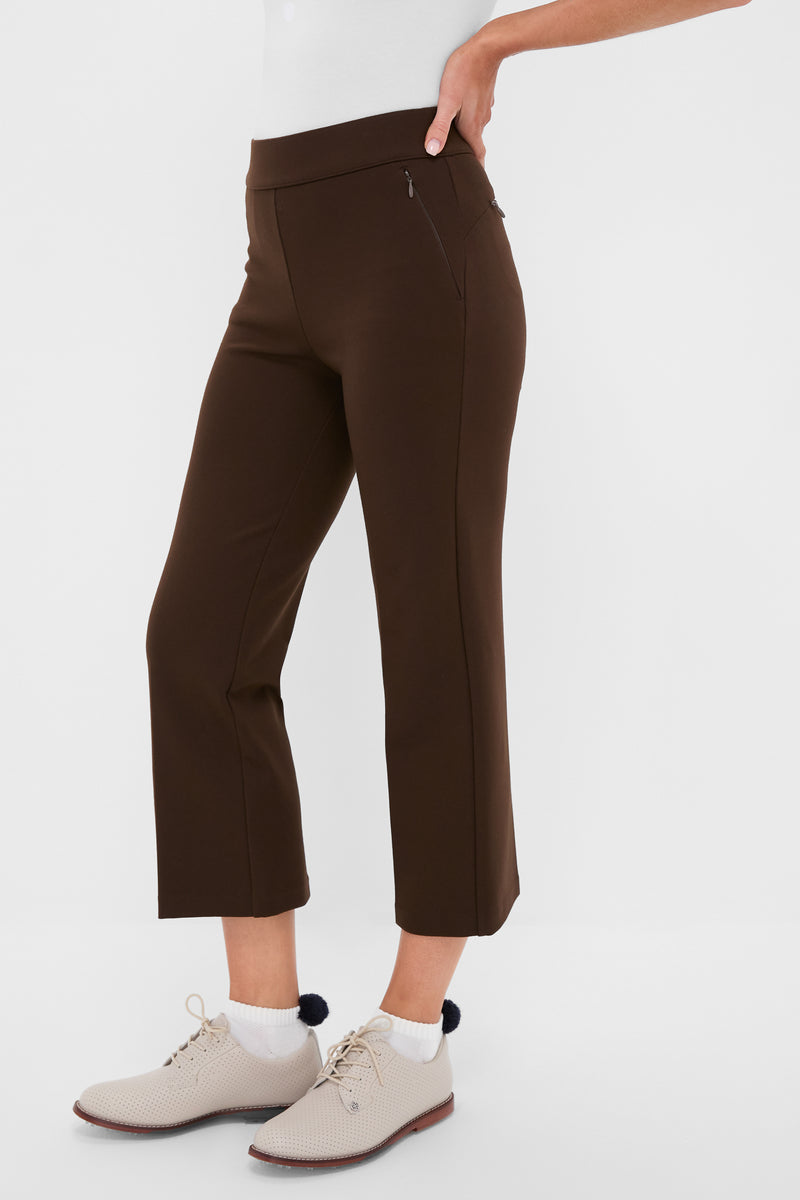 Classic and effortless Petite Chocolate Brown Compression September Pant, cropped with zip-pocket details, paired with fun pom-pom socks and high-end cream oxfords.