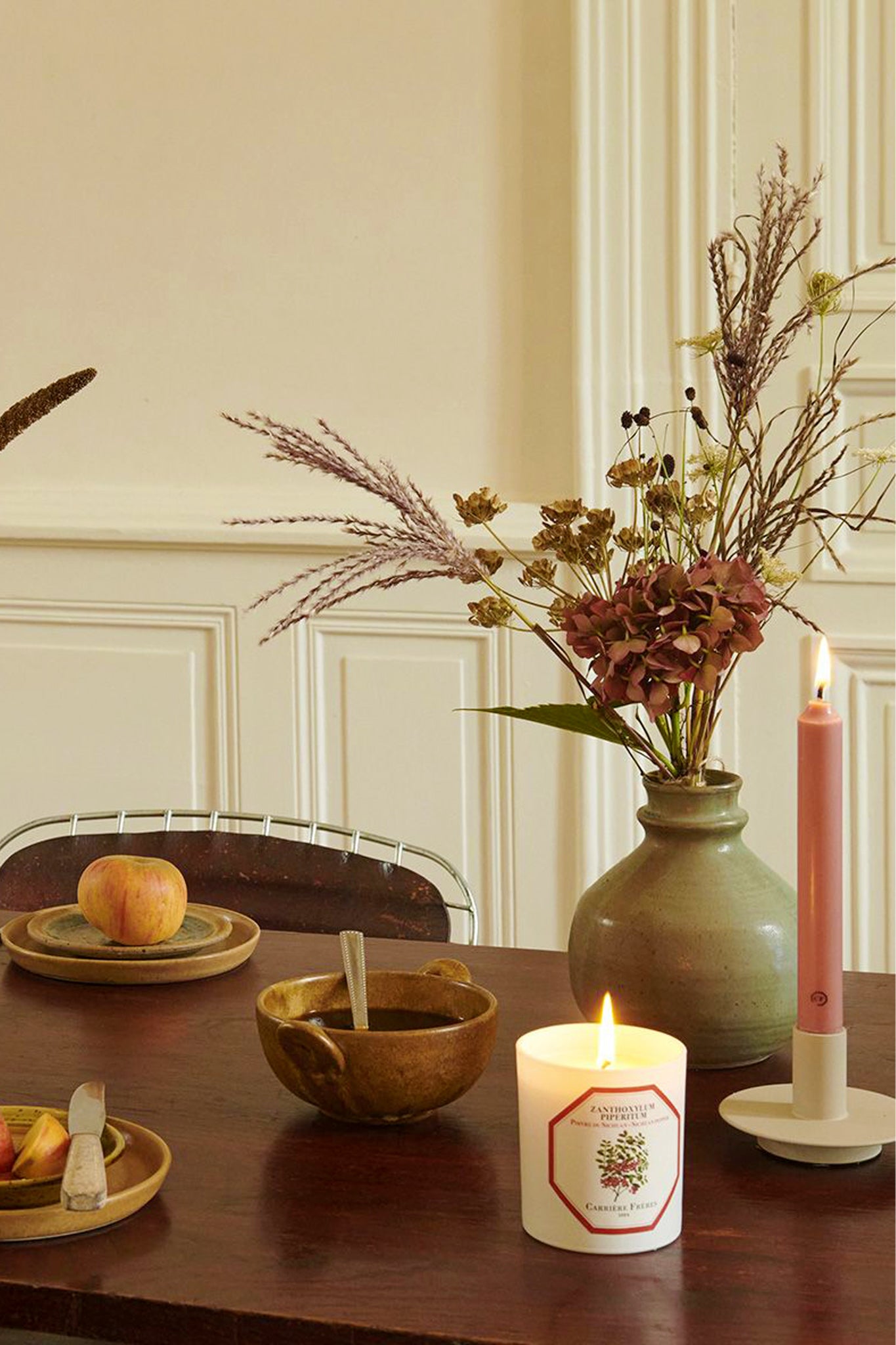 Spearmint Scented Taper Candles add classic elegance to a cozy tabletop with effortless style, featuring a warm, high-end breakfast arrangement.