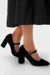 Classic Black Velvet Julia Heels with a block heel and adjustable strap offer effortless style and fun sophistication, perfect for high-end occasions.