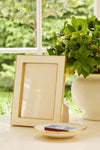 5x7 Cream Classic Shagreen Frame: A high-end, effortlessly classic frame with embossed shagreen and polished brass, elegantly displaying art or photos, embodying AERIN's luxury lifestyle.