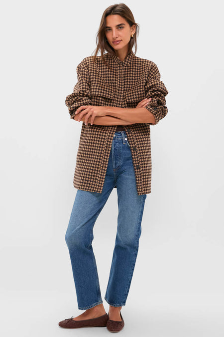 Model in Noir and Noisette Florian Coat: an oversized, classic houndstooth shacket, styled with faded jeans and suede flats, exuding effortless, high-end autumn chic.