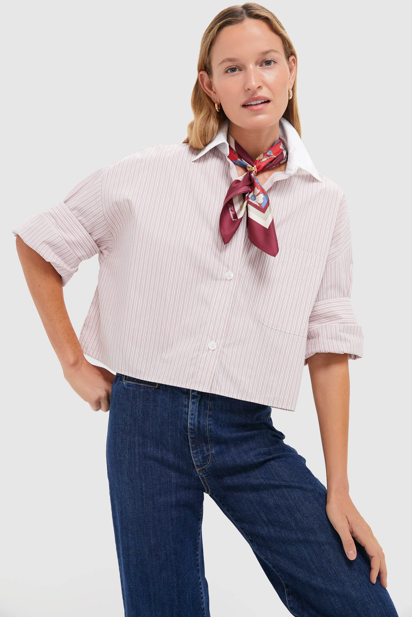 Model wearing the Spanish Villa and White Next Ex Shirt, a classic, boxy, cropped button-down with rolled sleeves, embodying effortless, high-end style and fun sophistication.