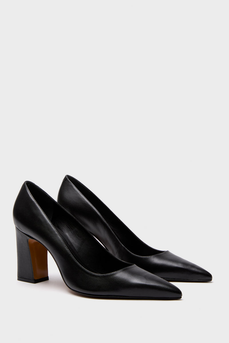 Black Eleanor Heels: Classic women's pumps with pointed toes and mid-height block heels, crafted from smooth leather for an effortless, high-end style. Perfect for a fun, confident look.