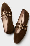 Chocolate Suede Buckle Nina Flats feature classic brown suede with two slim straps and gold-tone buckles, offering an effortless and fun, high-end look.