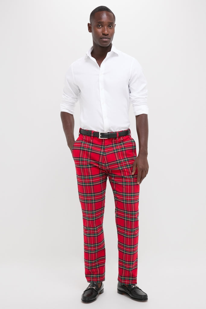 Man wearing Royal Stewart Tartan Stretch Twill Harbor Pants, embodying classic and effortless high-end style with a fun, coastal vibe, perfect for any occasion.