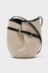 The Liffner beige belted bucket bag features linen canvas, a black leather strap with buckle detail, and Scandinavian-inspired design.
