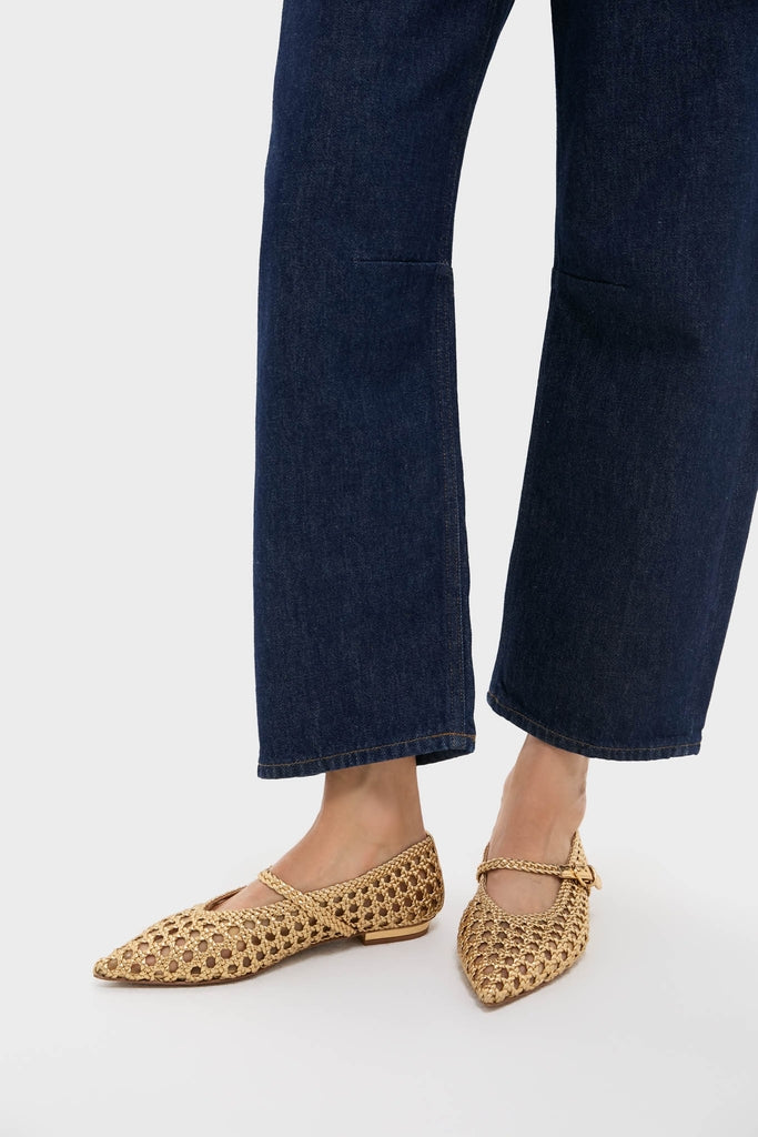 Gold Gracie Pointed Toe Crochet Flats worn with dark jeans, showcasing classic, effortless style. Handwoven vegan leather from Italy; perfect for fun, high-end looks.