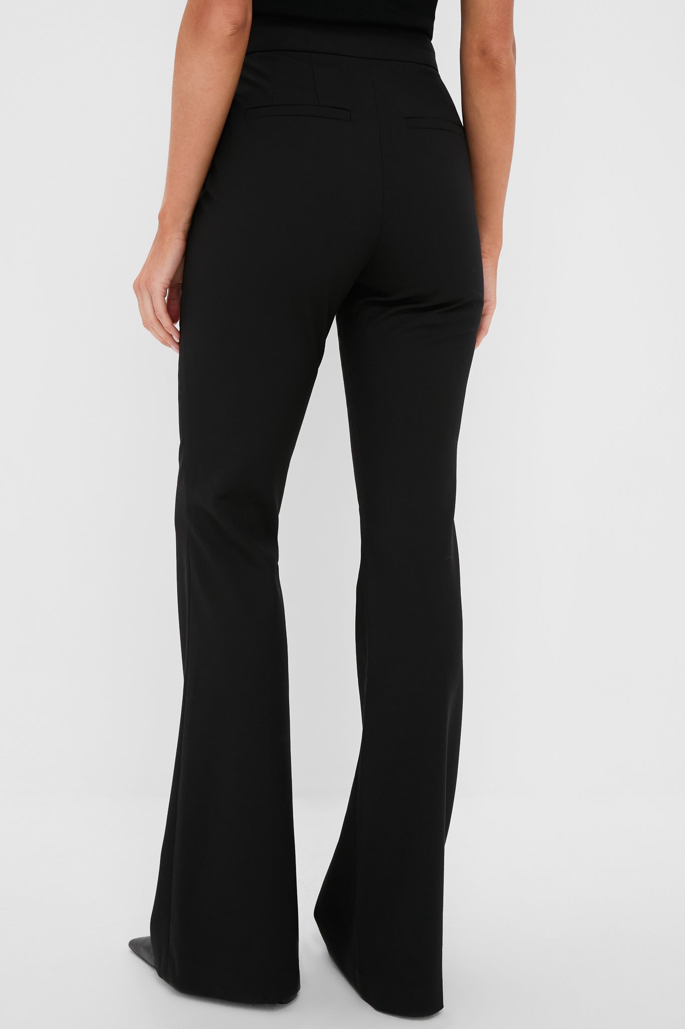 Black Sophie II Pants: Classic, high-end, flared-leg trousers with a fitted hip. Crafted for effortless style, featuring a mid-rise waist and slash pockets, perfect for fun, chic ensembles.
