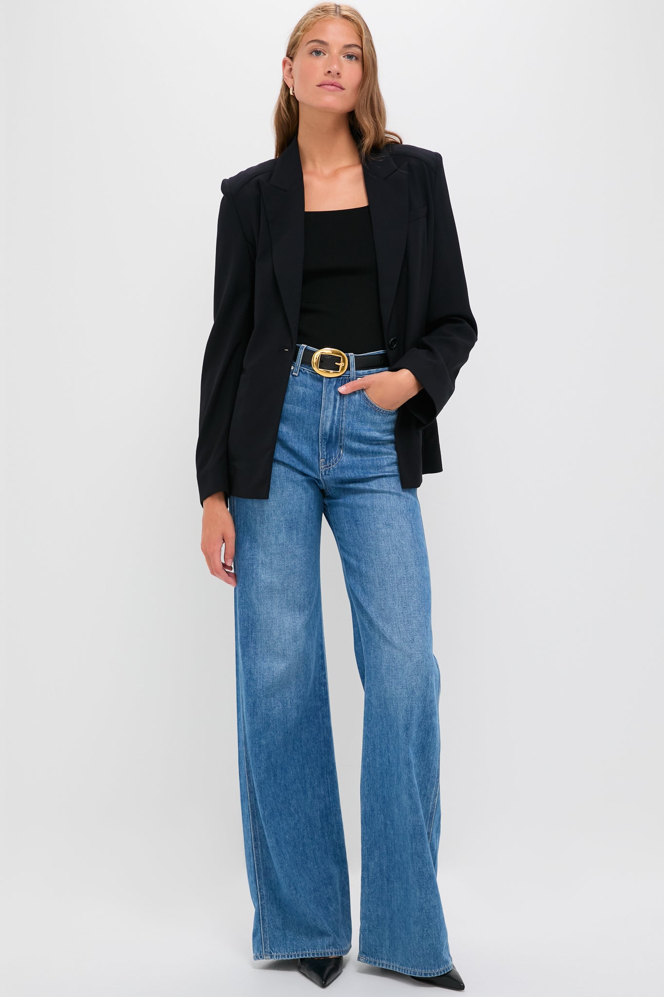 Midnight Boy Blazer exudes classic, high-end style with its relaxed fit, peak lapel, and drapey wool crepe, offering an effortlessly cool, fun look.