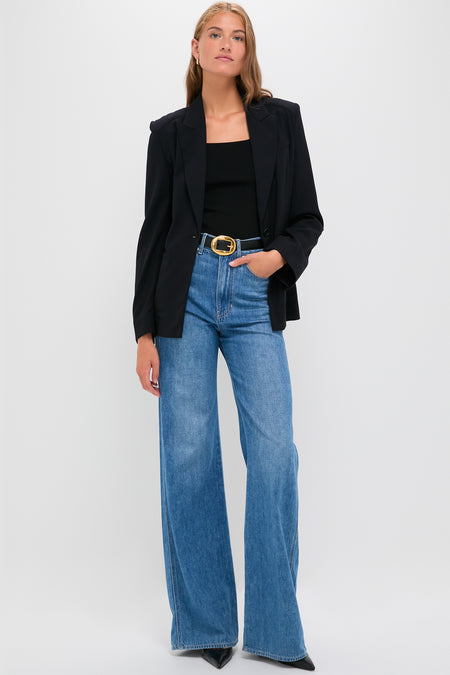 Midnight Boy Blazer exudes classic, high-end style with its relaxed fit, peak lapel, and drapey wool crepe, offering an effortlessly cool, fun look.