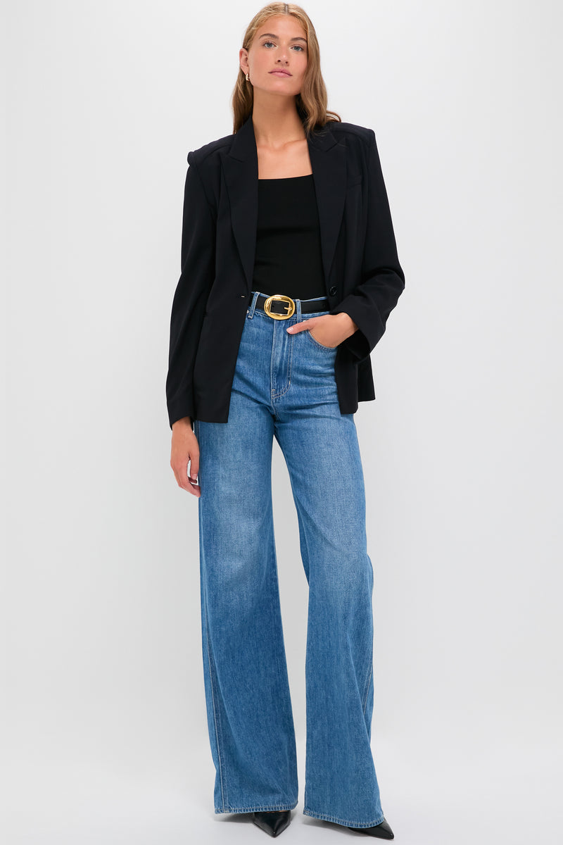 Midnight Boy Blazer exudes classic, high-end style with its relaxed fit, peak lapel, and drapey wool crepe, offering an effortlessly cool, fun look.